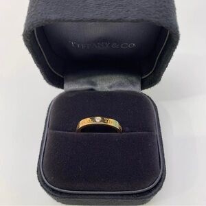 Tiffany & Co. Gold Ring with Diamond Accent
